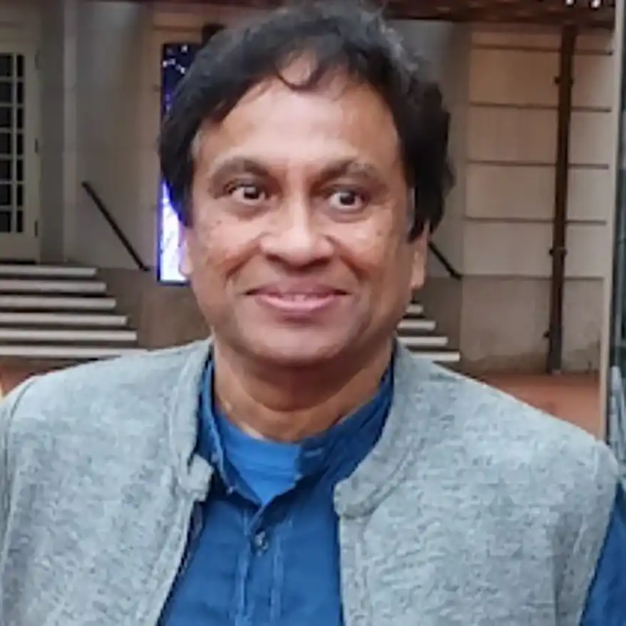 A portrait of Dr. C.P. Rajendran, a distinguished geoscientist,