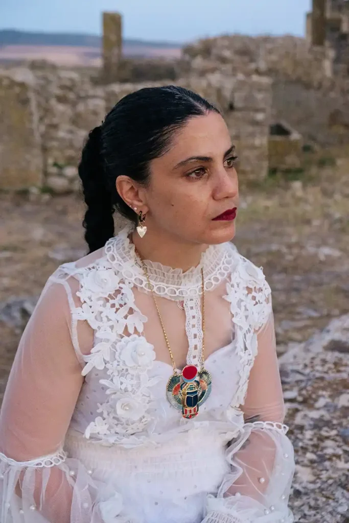 A Tunisian American singer-songwriter, musician, and producer, whose music has earned her international acclaim as a voice of resilience and empowerment, Emel is known for her bold artistry and dedication to achieving justice for the voiceless.