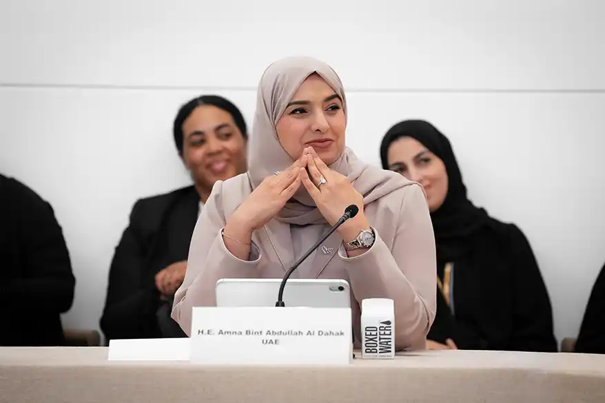 Her Excellency Dr. Amna Bint Abdullah Al Dahak, UAE Minister of Climate Change and Environment, speaking at the Nature Guardians Majlis in New York, with attendees in the background.