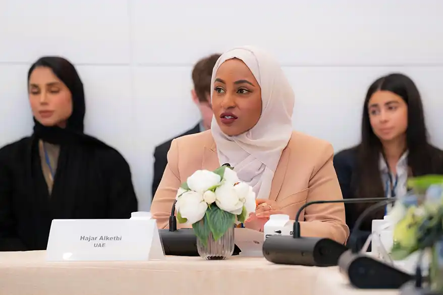 Hajar Alketbi, Director of Government Communications at the UAE Ministry of Climate Change and Environment, speaking at the Nature Guardians Majlis i