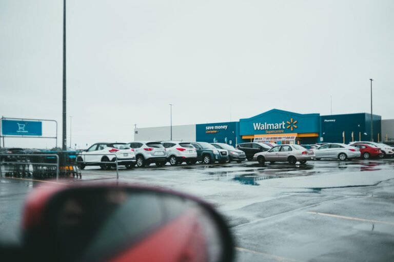 car parked in parking lot near shop