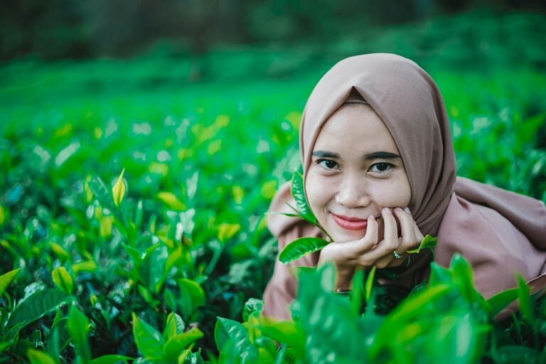 woman in brown hijab smiling