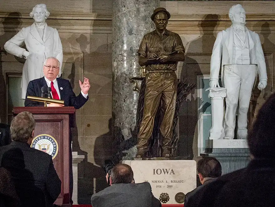 Borlaug Statue Committee Ambassador Kenneth M. Quinn speaks at the dedication of the Dr. Norman Borlaug statue in the National Statuary Hall at the U. S. Capitol in Washington, D.C. on Tuesday, Mar. 25, 2014.