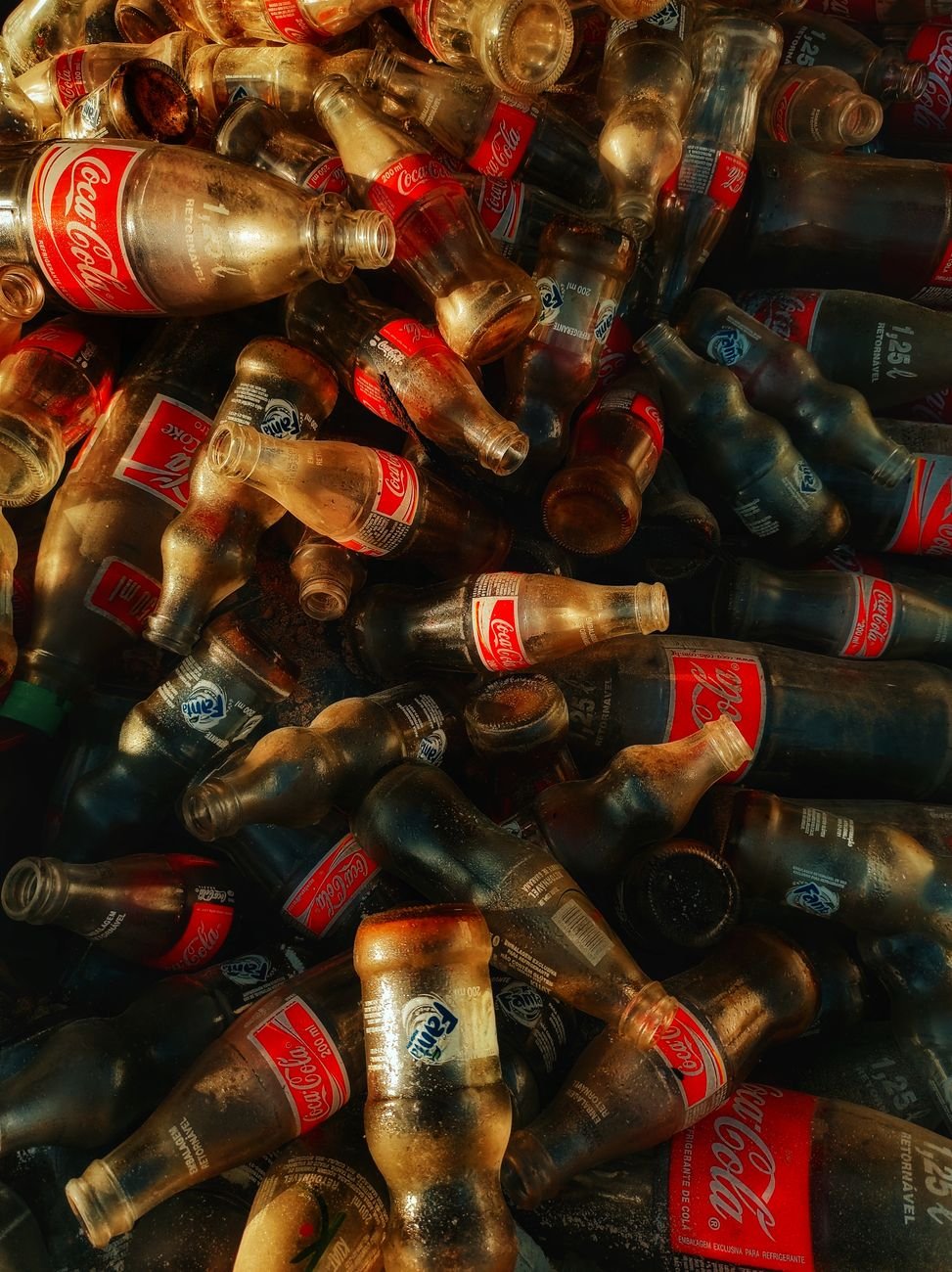 plenty of coca cola bottles