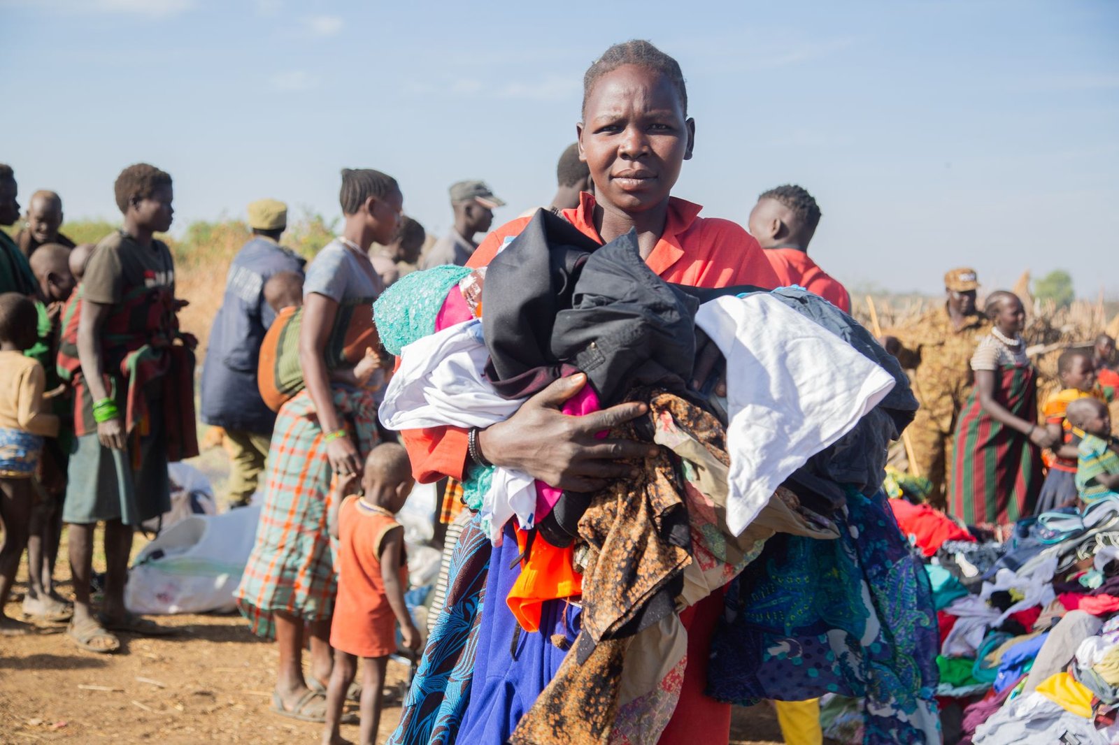 community gathering for clothing distribution
