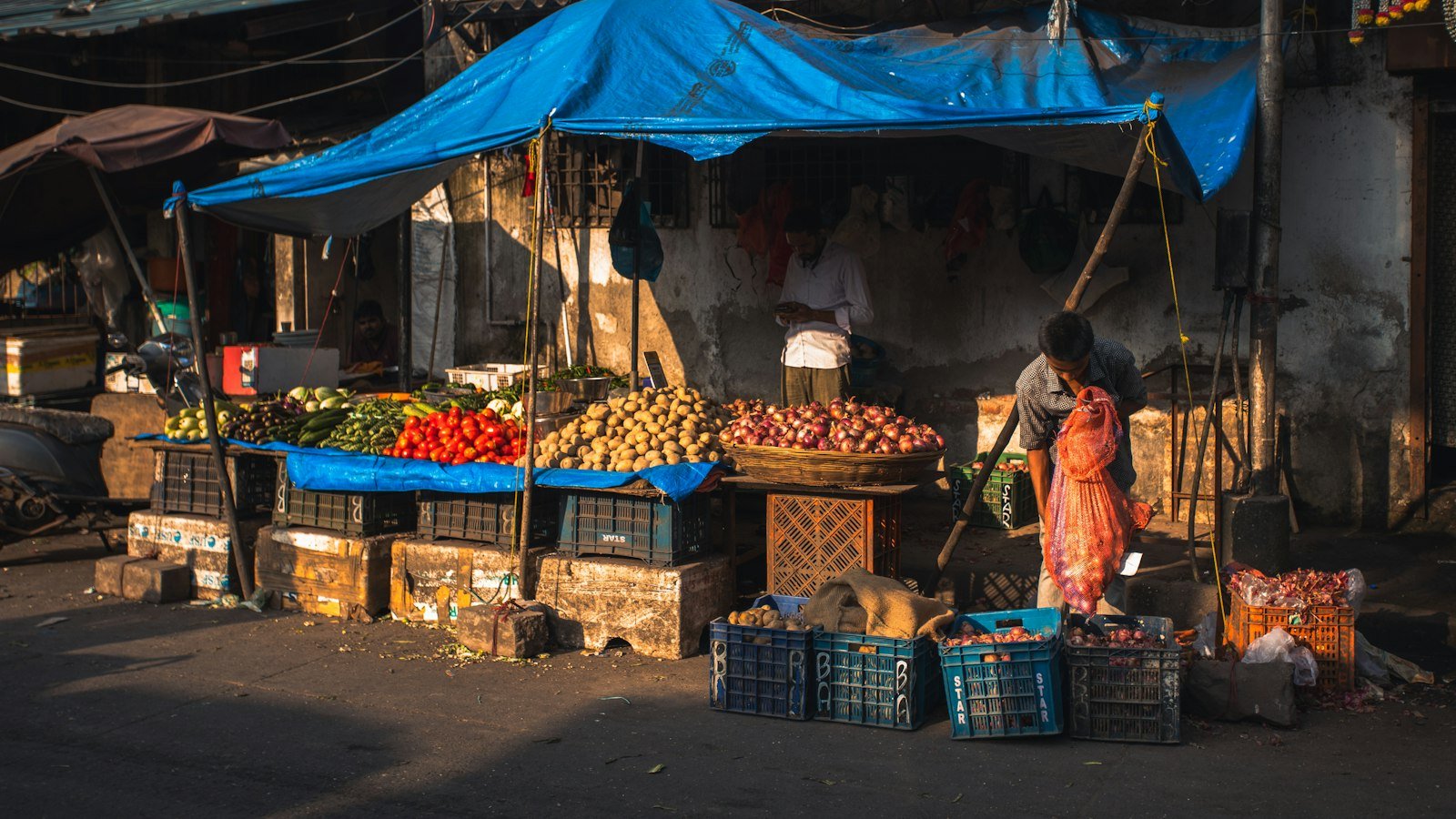 Street vendor at an outdoor produce market