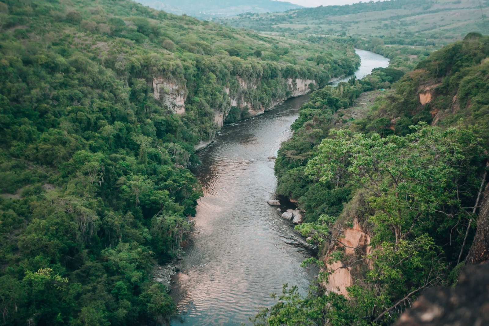 a river between the mountain
