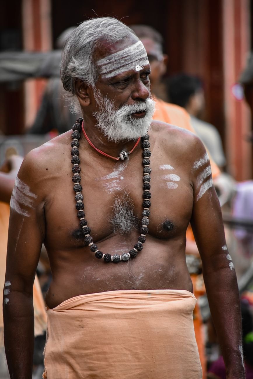 portrait of man in traditional necklace
