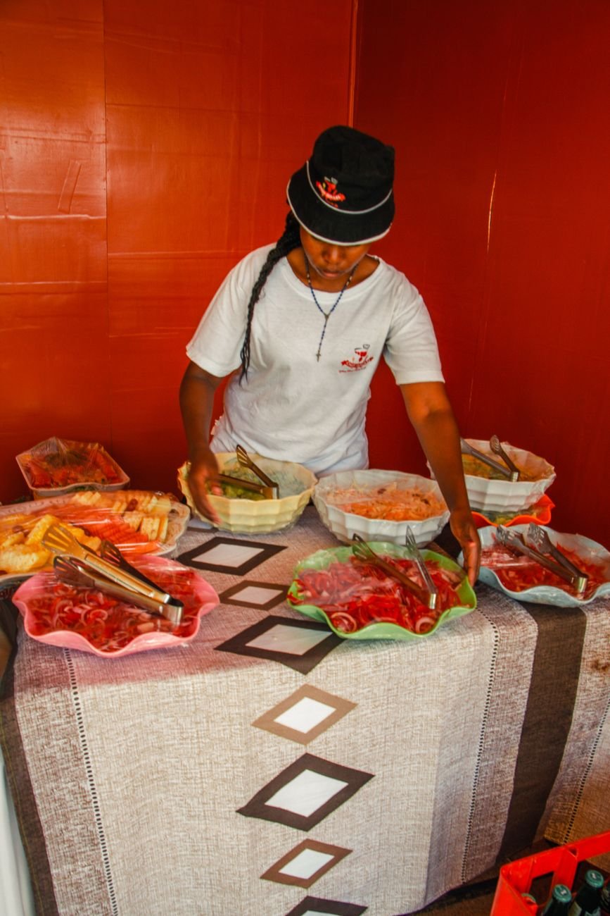 woman preparing a buffet