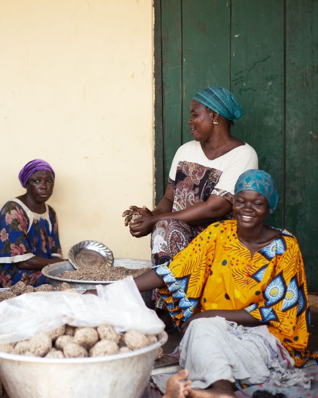 women in tamale engaged in traditional cooking