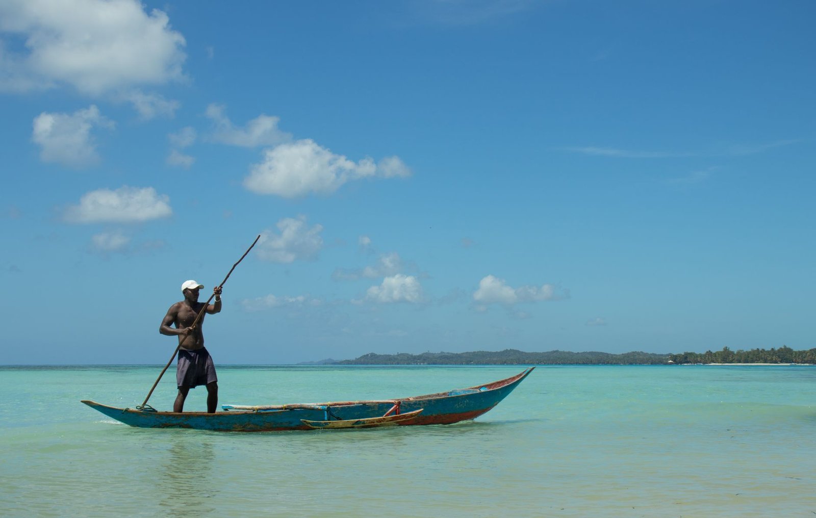 man riding a boat